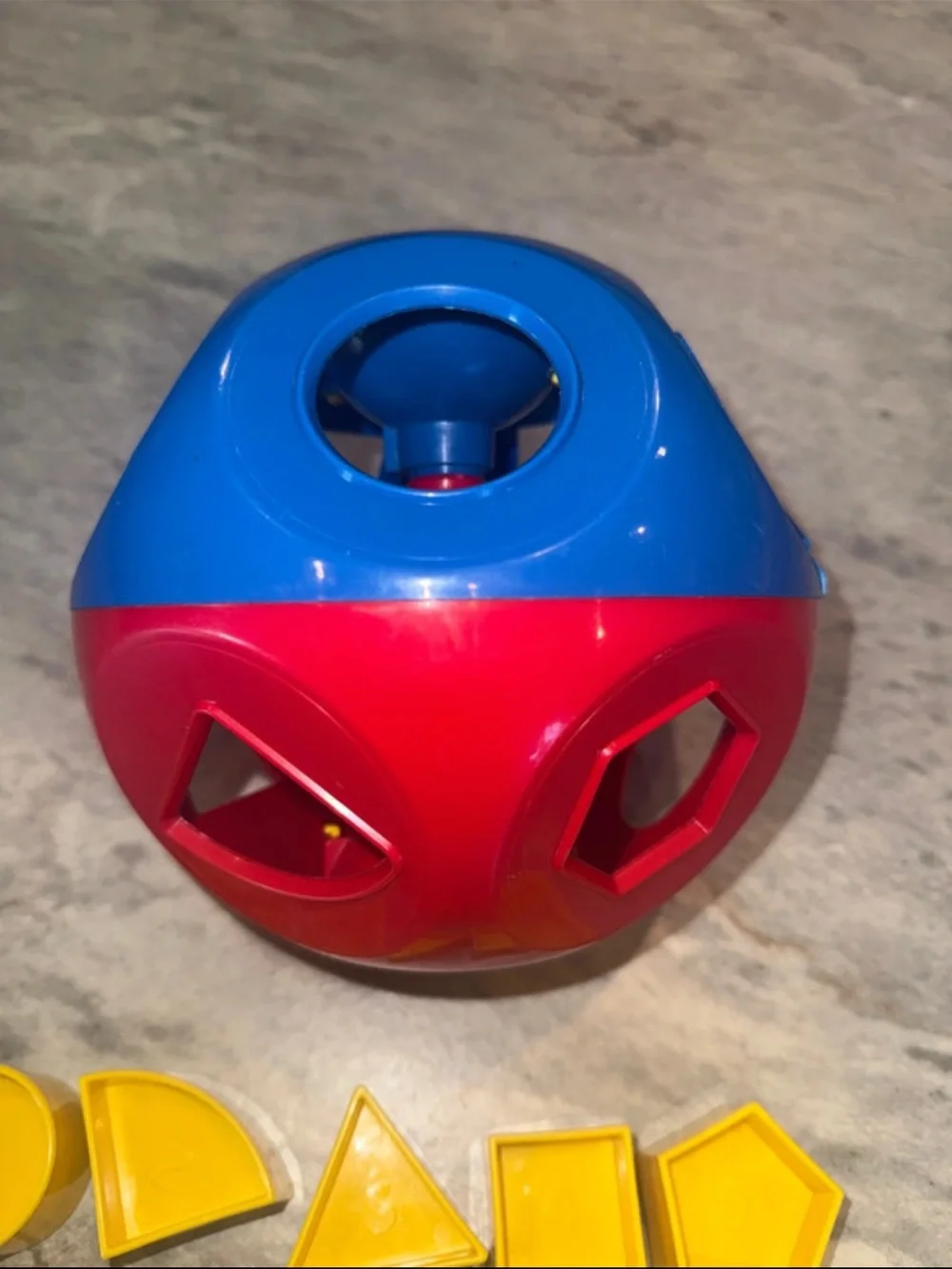Tupperware Red Shape Sorter Ball with Yellow Geometric Pieces